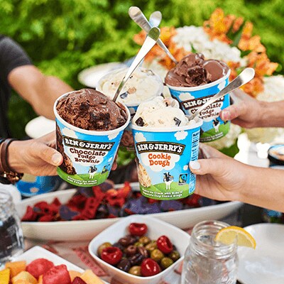 Cheers with pints of Ben & Jerry's Ice Cream